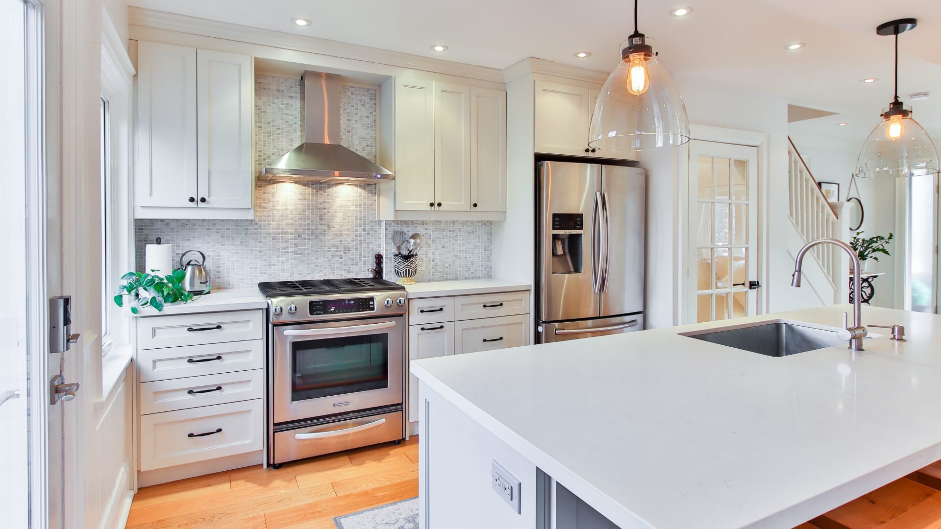 kitchen with slide in range and wall oven